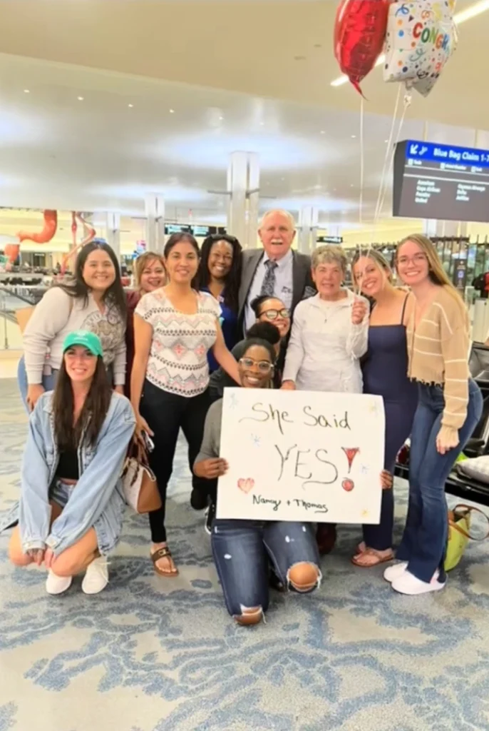 "Close-up of the engagement ring on the finger of the newly engaged elderly woman."