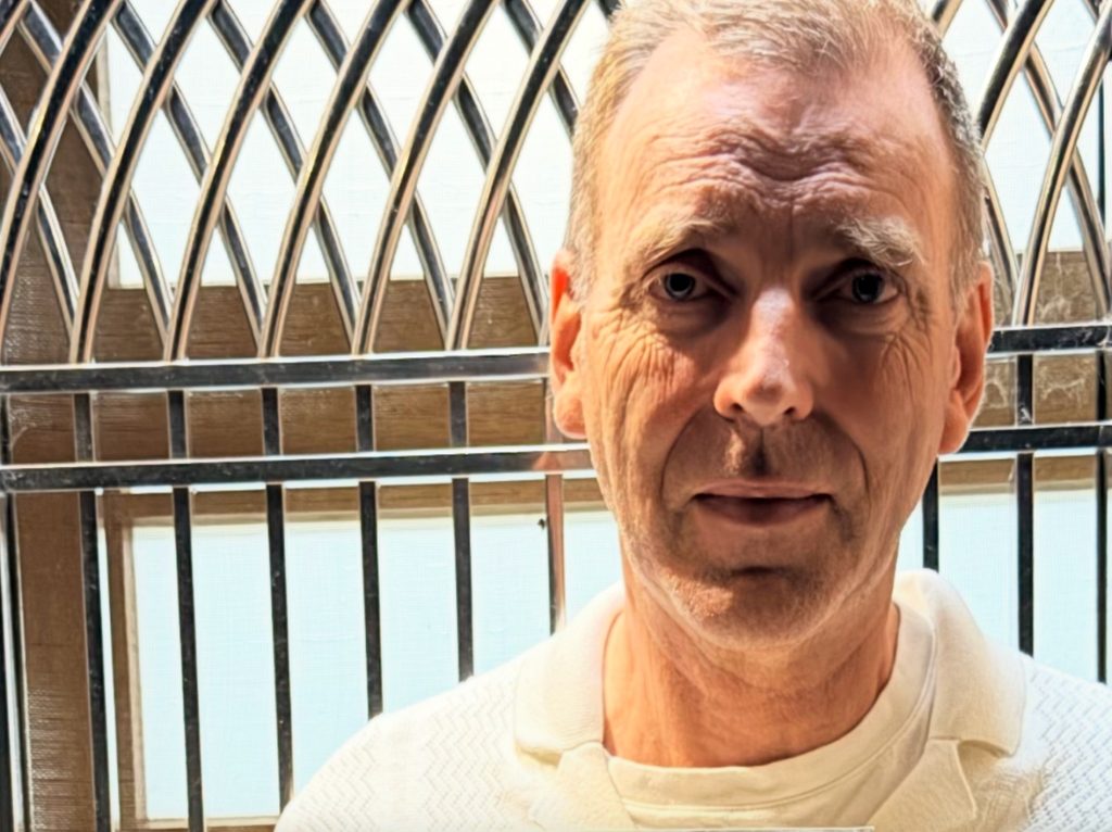 "Laurence Watkins with his new 2025 Guinness World Records certificate for longest personal name"