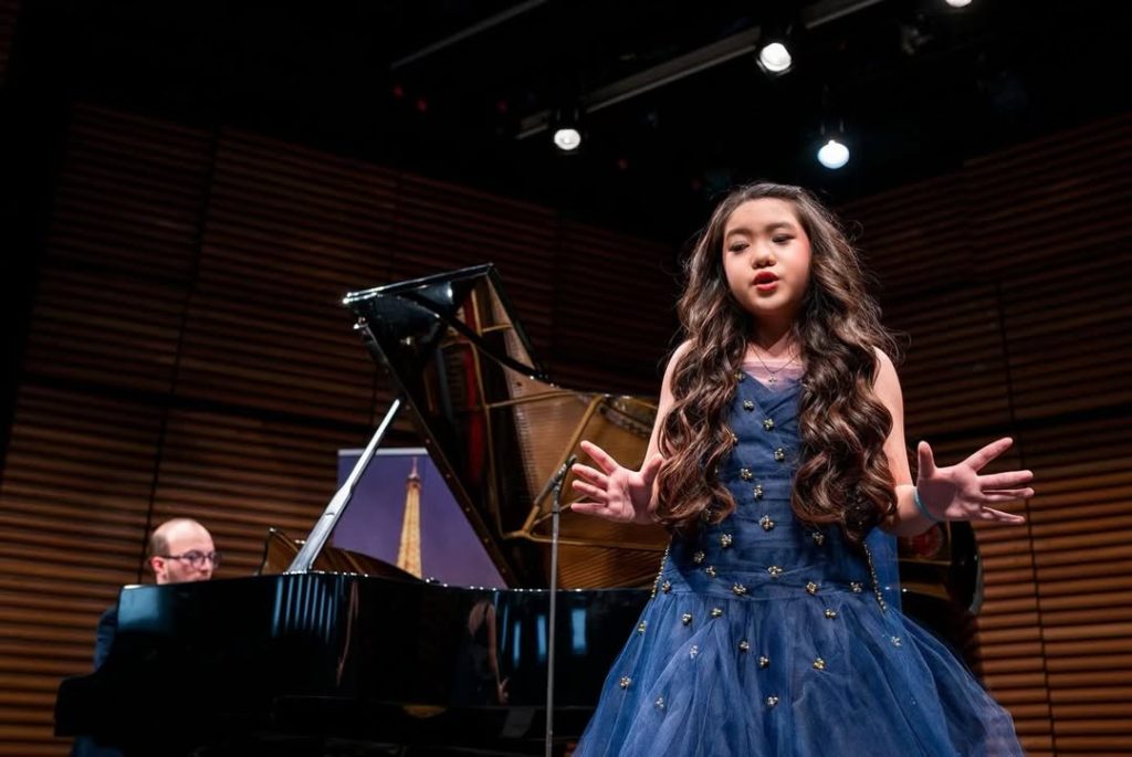 Taylor Louise singing From The Start by Laufey live on stage in Paris