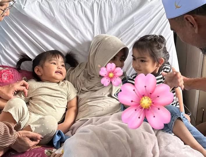 Side view of the luxury BMW car being sacrificed and sold to cover high medical bills for Soft Tissue Sarcoma treatment