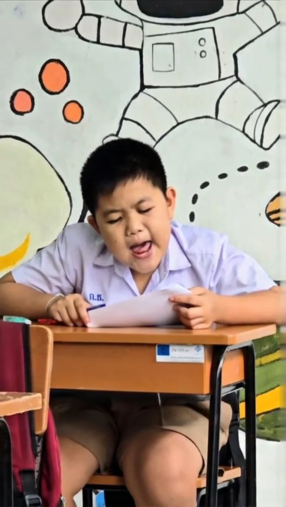  Funny classroom moment showing students' shocked reactions to a harder-than-expected math test.