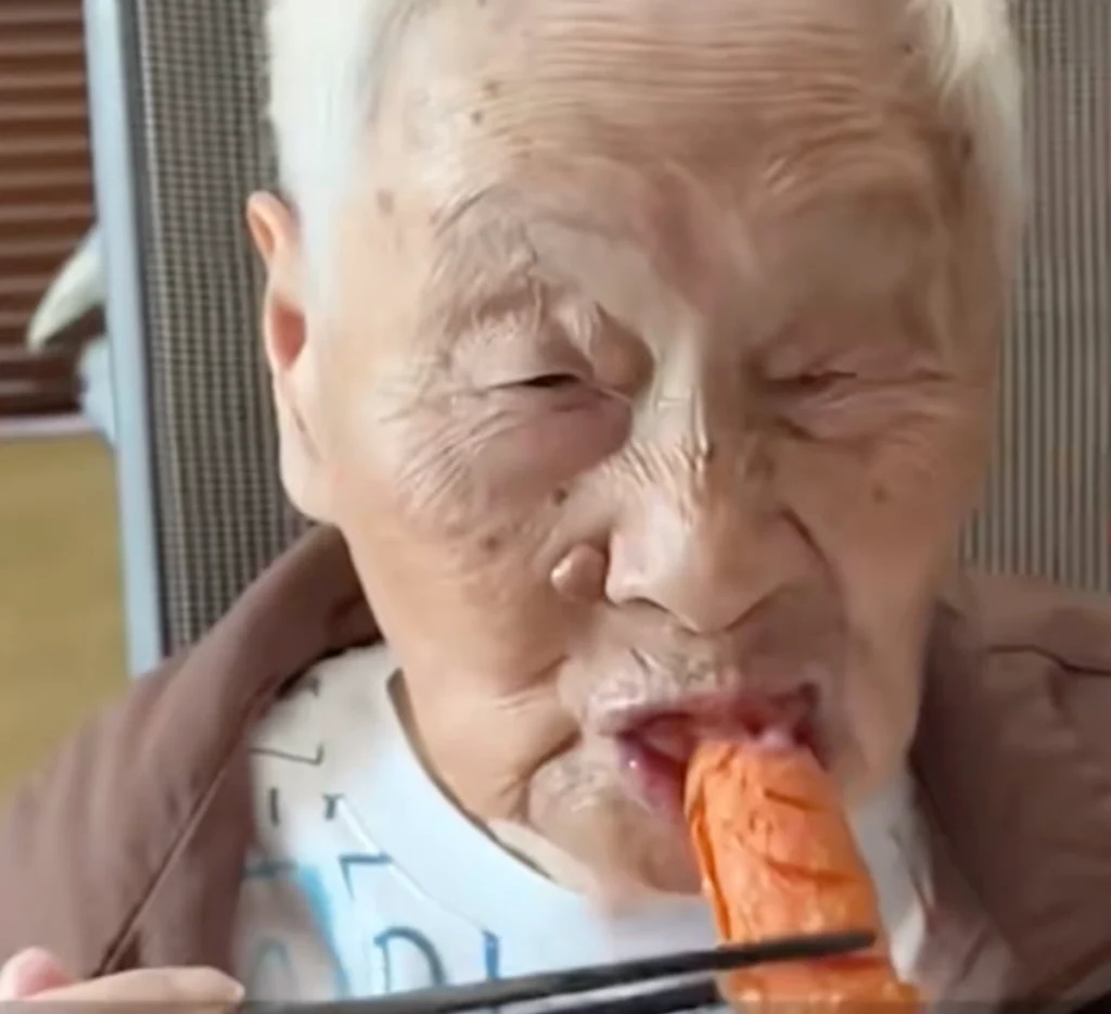 Elderly woman eating fast food and fried chicken viral food blogger
