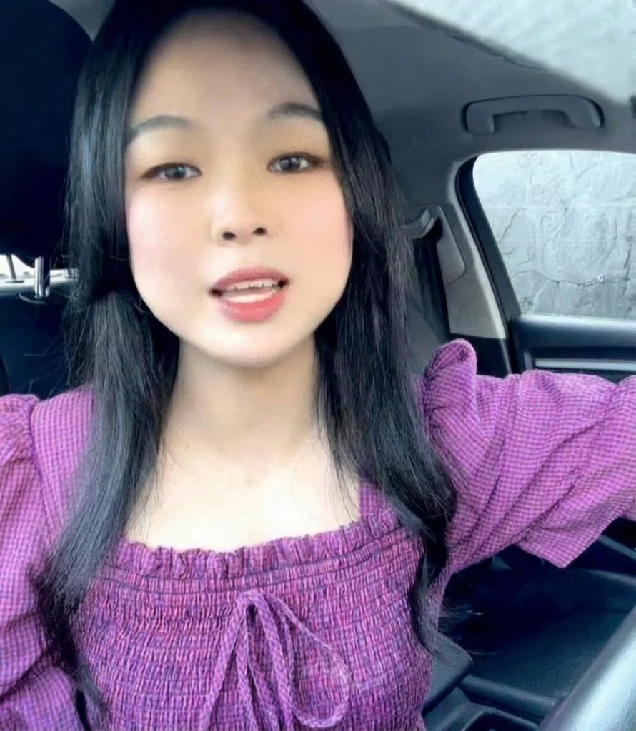  Chinese family sitting in a living room discussing boundaries and privacy issues